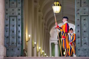 VATICAN CITY, ITALY - MARCH 1, 2014 A member of the Pontifical Swiss Guard, Vatican. photo