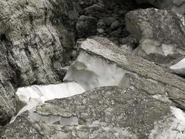 The view of workers cover Marmolada glacier during summer time preventing ice melting, Trentino-Alto Adige, Italy. photo