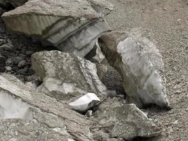 The view of workers cover Marmolada glacier during summer time preventing ice melting, Trentino-Alto Adige, Italy. photo