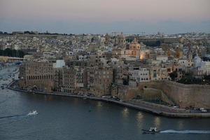 malta 3 cities view from la valletta at sunset photo