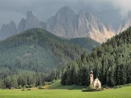 ranui church in south tyrol funes valley dolomites italy photo