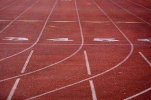running athletic track lanes racetrack detail photo