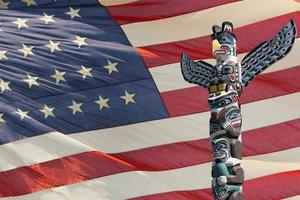 Totem wood pole ion usa flag background photo