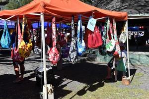 RAROTONGA, COOK ISLANDS - AUGUST 19 2017 - Tourist and locals at popular Saturday Market photo