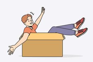 Smiling boy have fun sitting in cardboard box. Happy young man in carton package excited about moving or relocation. Vector illustration.