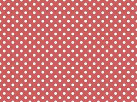 white polka dots over indian red background vector