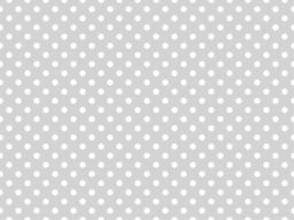 white polka dots over light gray background vector