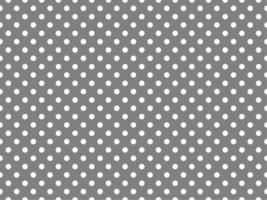 white polka dots over gray background vector