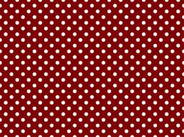 white polka dots over maroon background vector