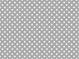white polka dots over dark gray background vector