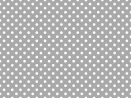 white polka dots over dark gray background vector