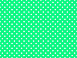 white polka dots over spring green background vector