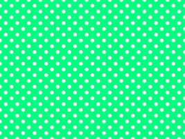 white polka dots over spring green background vector