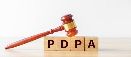 PDPA block with  judge gavel on table. Personal Data Protection Act, Law, lawyer, judgment, sensitive information and privacy data concepts photo