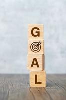 GOAL block with dartboard sign. Business Goal, Target, Objective, strategy, plan, Action motivation, mission and process concepts photo