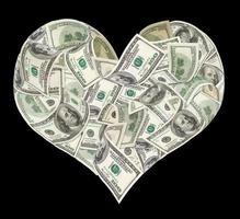 Heart sign made by 100 dollar banknotes photo
