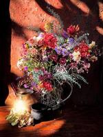 Romantic bouquet with flowers of dahlia, chrysanthemum, perennial aster, montbrecia photo