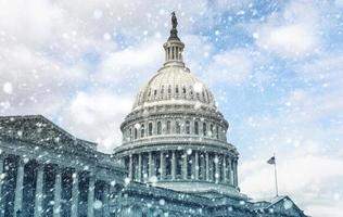 Capitol building in Washington D.C. during snow storm photo