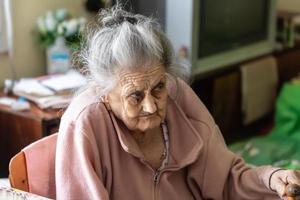 very old tired woman photo