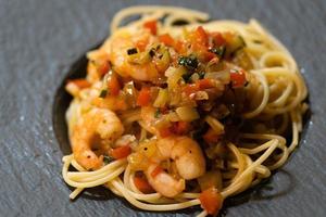 Spaghetti alla busara pasta with shrimps an Italien specialty photo