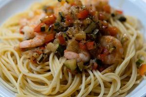 Spaghetti alla busara pasta with shrimps an Italien specialty photo