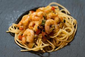 Spaghetti alla busara pasta with shrimps an Italien specialty photo