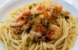 Spaghetti alla busara pasta with shrimps an Italien specialty photo