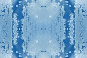 Pattern of few repeated frosty patterns in trendy 2020 Classic Blue as Christmas festive natural background. photo