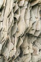 Close-up natural pattern of vertical layers of grey mountain slate. photo
