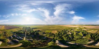 aerial full seamless spherical hdri 360 panorama view above green village with private development sector with country houses in equirectangular projection. photo