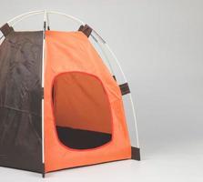 empty orange pet tent isolated on white background. photo