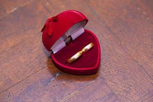 Wedding rings in a beautiful red box photo