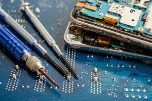 Repairing and upgrade mobile phone, electronic, computer hardware and technology concept. photo