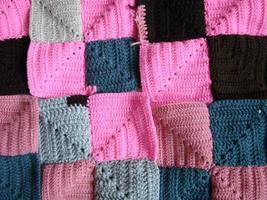 Crochet texture, colorful squares pattern. Crochet Knit Squares photo