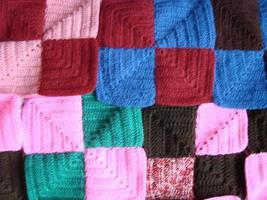 Crochet texture, colorful squares pattern. Crochet Knit Squares photo