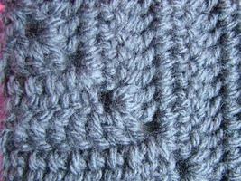 textura de ganchillo, patrón de cuadrados coloridos. cuadrados tejidos a crochet foto