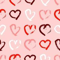 Seamless pattern with hand drawn hearts. Doodle grunge multicolor hearts on pink background. Vector illustration.