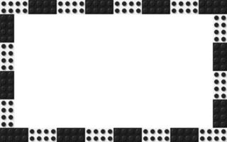 Simple frame composed of black and white toy blocks. Black and white brick banner. Abstract vector background