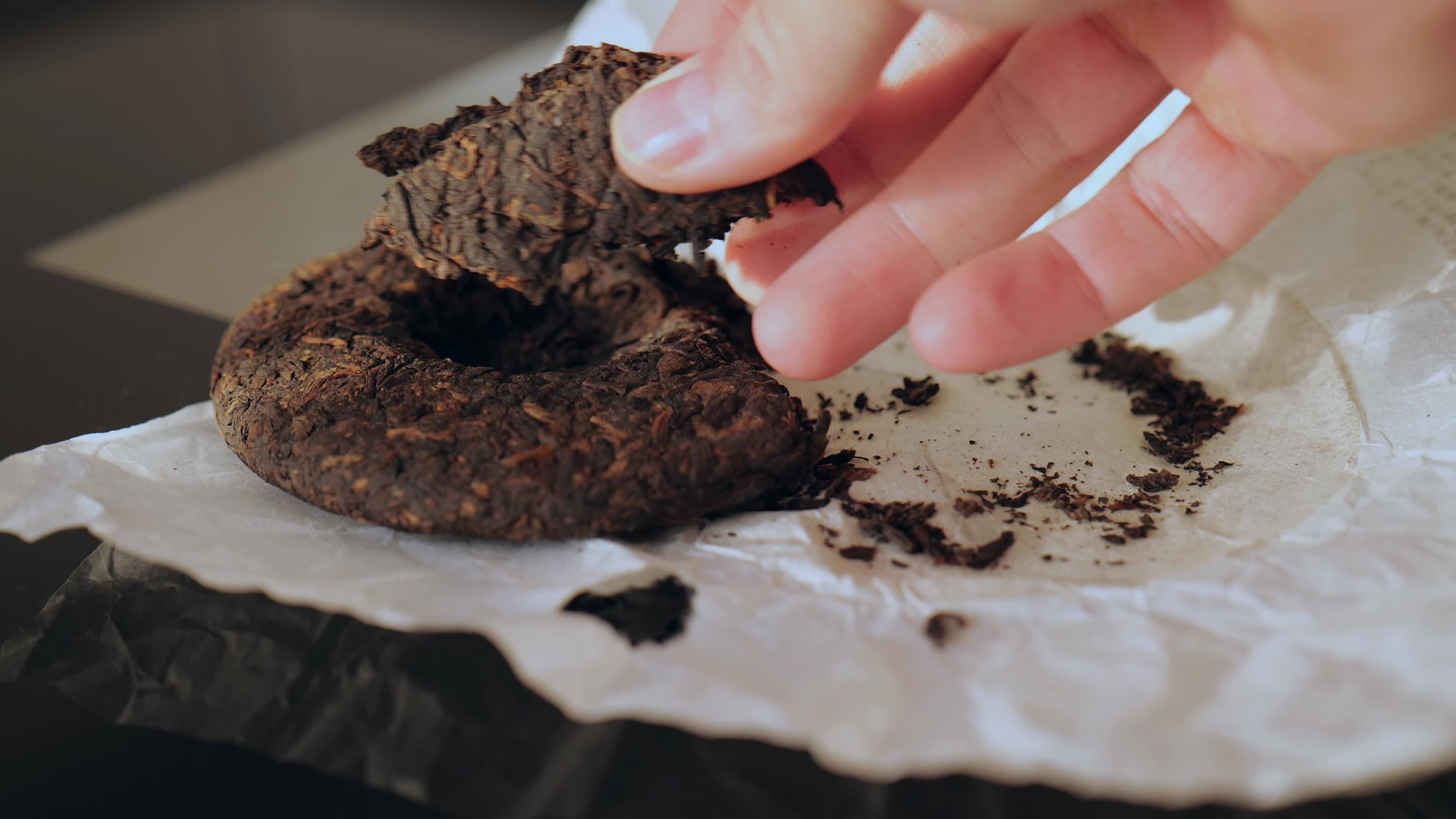 a broken piece of pressed tea 17399472 Stock Video at Vecteezy