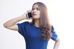 Businesswoman talking on the phone with customers happily because of reaching a mutual investment agreement photo