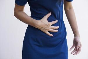 Woman suffer from stomachacheChronic gastritis Abdomen bloating concept photo