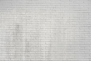 Vintage white wash brick wall texture for design. Panoramic background for your text photo