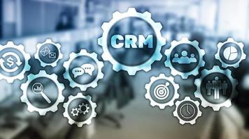 CRM, Customer relationship management system concept on abstract blurred background. photo