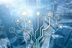 Telecommunication and IOT concept on blurred business center background. photo
