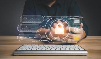 Businessman touch a virtual screen to unlock and access information and document, Protection network security computer and safe data, cybersecurity concept, user privacy security and encryption photo