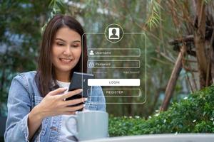 Woman using smartphones to type user and passwords for login financial applications,  identification information security, and encryption, Concept of Cyber security for internet access photo
