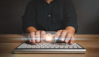 Asian Businessman typing username and password for unlock network connections before assigning bank accounts, credit card, and confidential data. Cyber security internet and networking concept photo