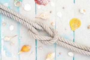 pattern rope on a blue old wooden background. Top view. Leave a copy space for writing descriptive text. photo