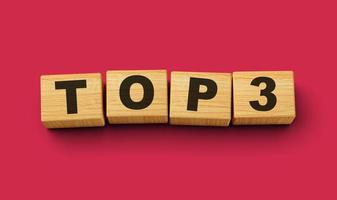 Wooden blocks with Top three Top 3 word on colorful isolated background 3d illustration photo