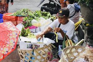 Badung Bali  January 13 2023 Photo of a seller waiting for someone to buy his wares at Pasar Kumbasari Badung